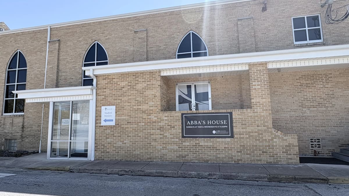 Side view of Abba's House DFW church sign and entrance